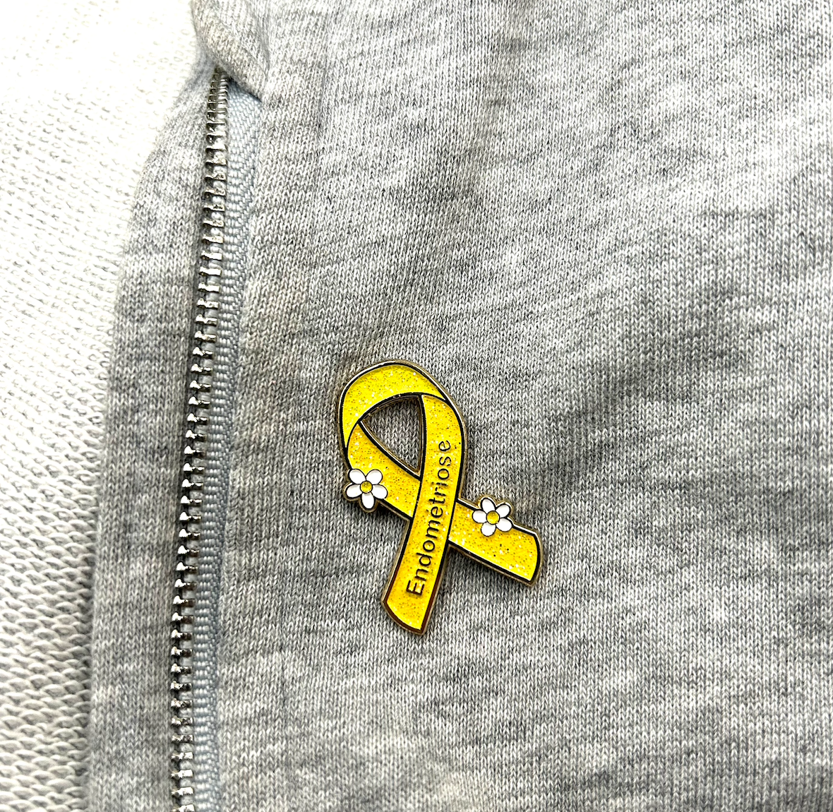 Pin's RUBAN JAUNE PAILLETE - ENDOMETRIOSE